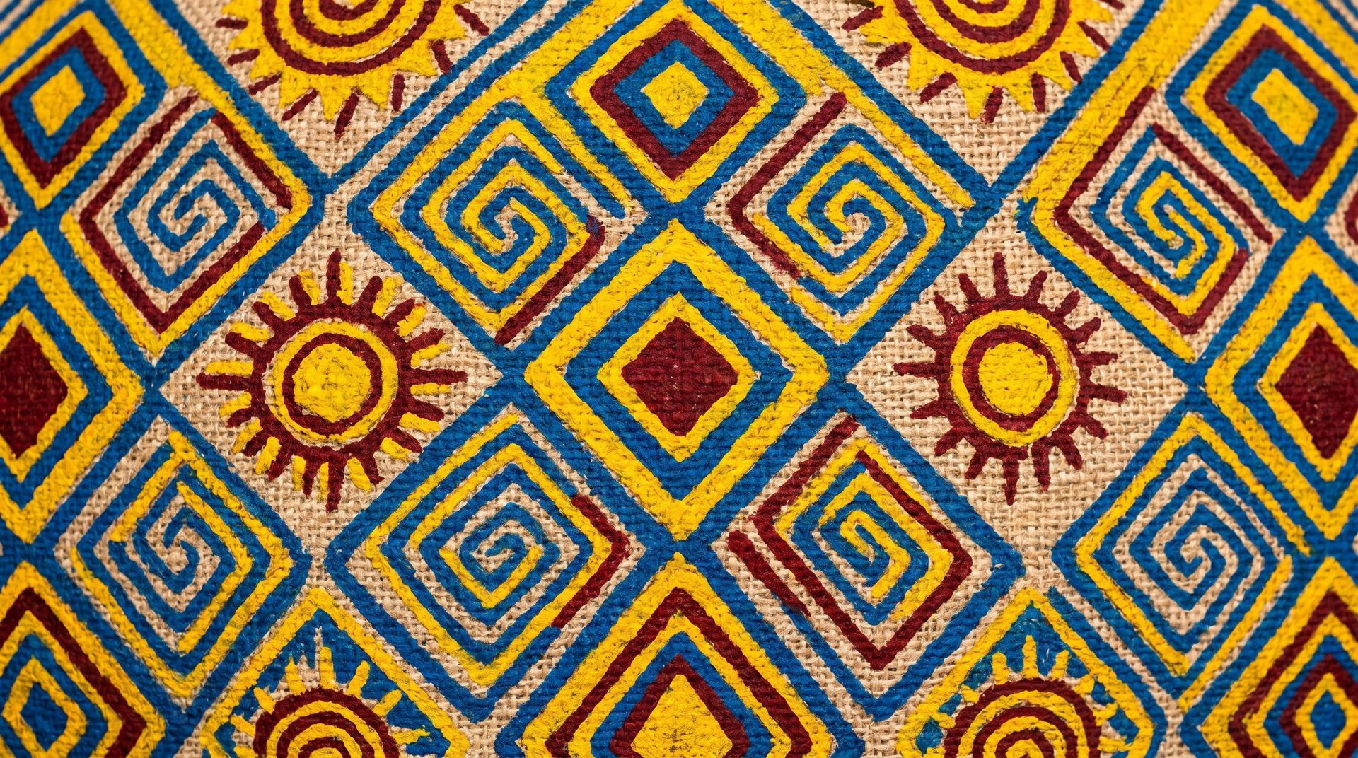 Grafismos geométricos indígenas Xukuru e Fulni-ô em amarelo, azul e vermelho